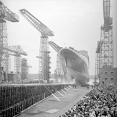 Photograph of the Cunard liner RMS Queen Elizabeth 2 going down the slipway at the shipyard of John Brown & Company, Clydebank, 20 Sep 1967 (Crown Copyright, National Records of Scotland,UCS1/118/736/1356)