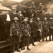 Image of soldiers, a sailor and railway staff at Galashiels Station, about 1916 (Image Gallery Reference: AAA00407)