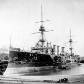 Photograph of the port side of the Royal Navy Powerful-Class armoured cruiser HMS Terrible at John Brown's (J & G Thomson's shipyard), Clydebank newly completed, 1895 (Crown Copyright, National Records of Scotland, UCS1/116/1/38)