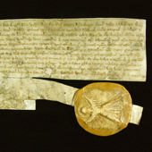 Image of the warrant of Edward I with Seal of the Guardians of Scotland attached, Order by Edward I for payment of 2s. a day to Master Alan de Dunfres, Chancellor of Scotland, and his clerk, 4 July 1292 (Crown Copyright, National Records of Scotland, RH5/55)